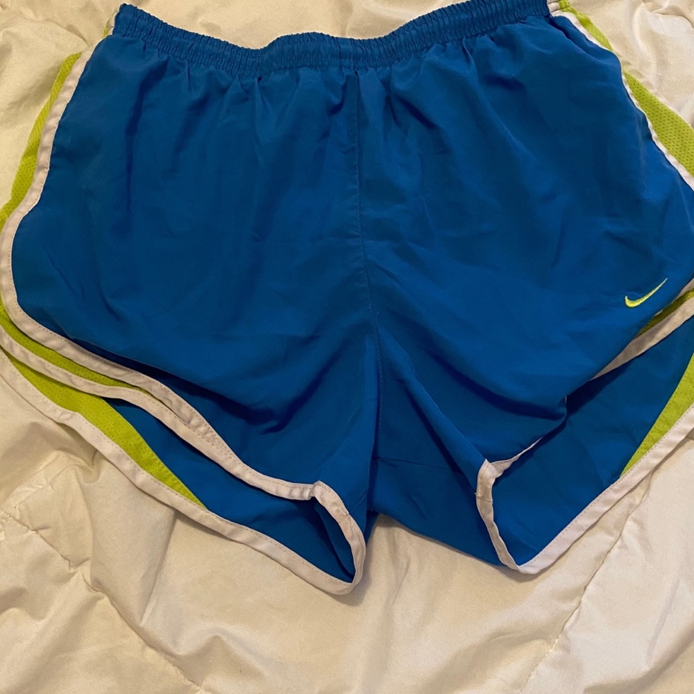 green and blue nike shorts